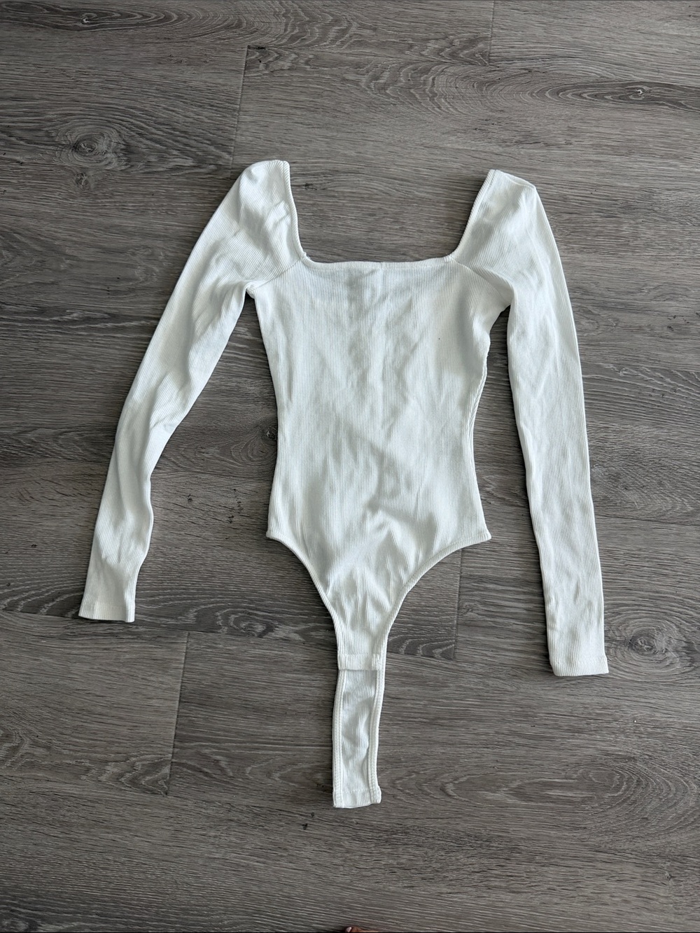 Long-Sleeve White Ribbed One-Piece Bodysuit